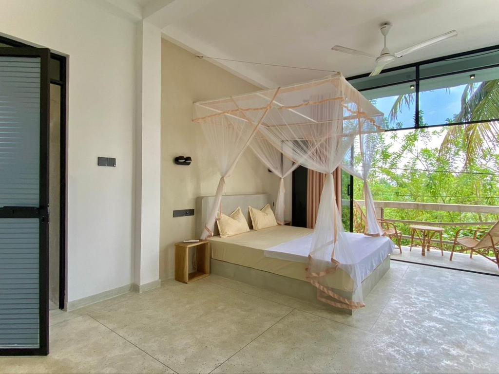 Отель Lotus Surf House Мидигама-Ист Экстерьер фото